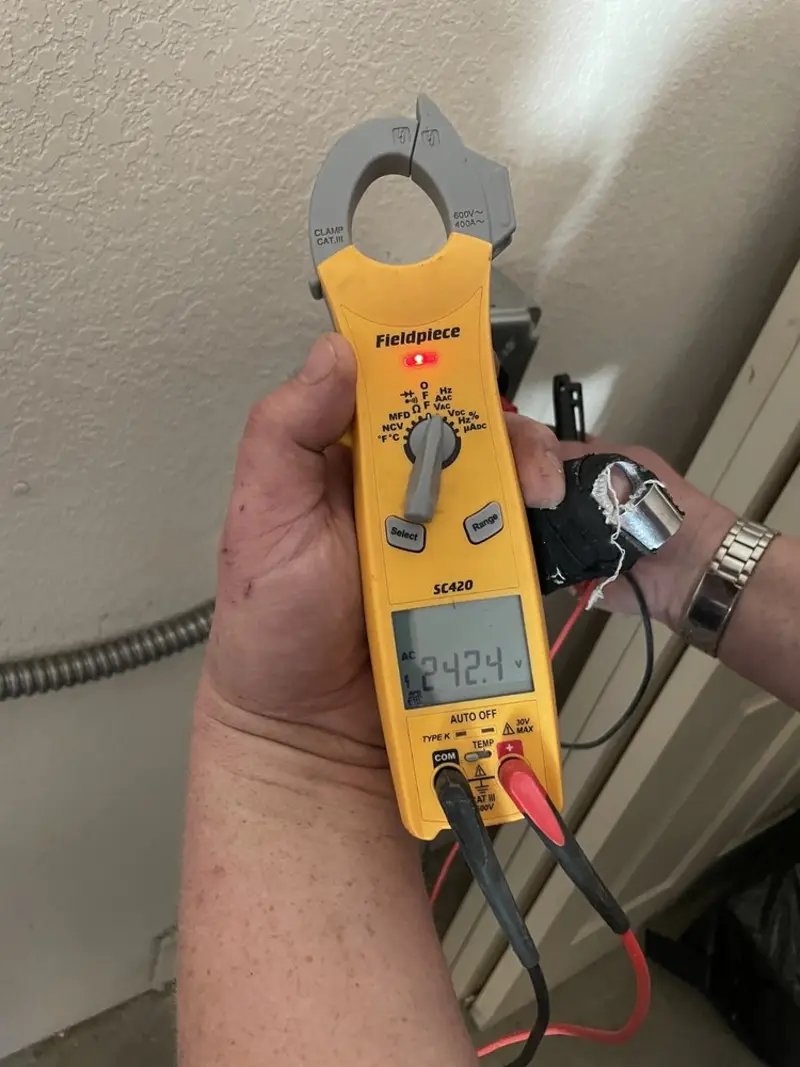 Voltage testing with clamp meter during Aluminum Wiring Replacement in Woolwich